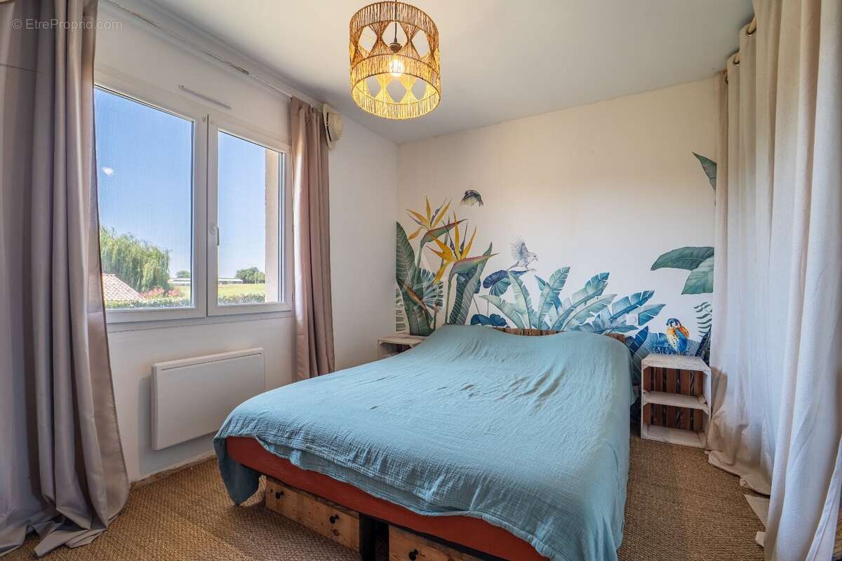 Maison familiale de plain pied de 121 m² - photo 6