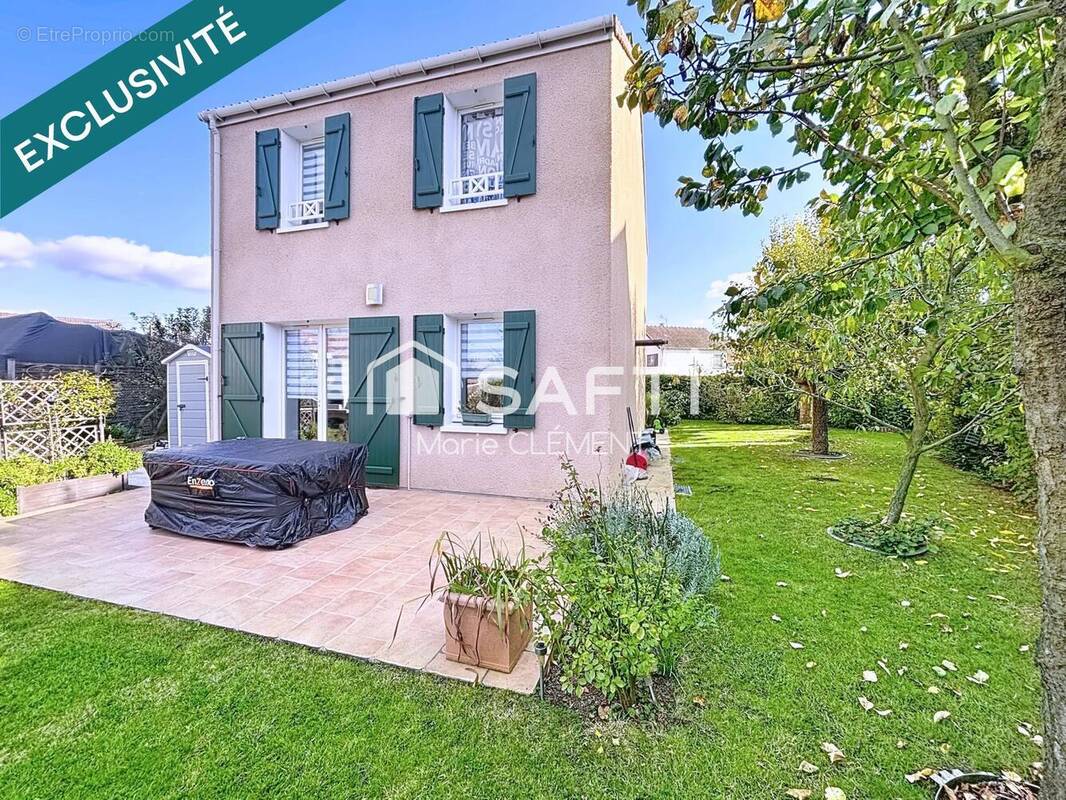 Photo 1 - Maison à BRIE-COMTE-ROBERT