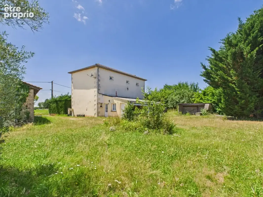 Propriété familiale avec potentiel - photo 15