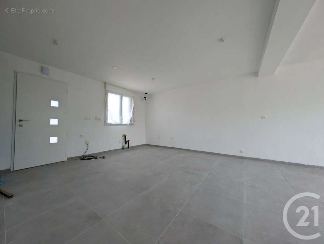 Maison 107 m² à Marzan  - photo 4