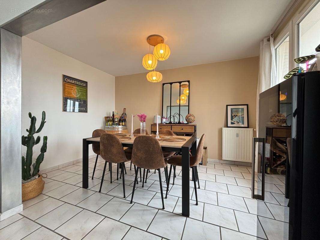 Appartement T4 de 75 avec balcon et cave - photo 6
