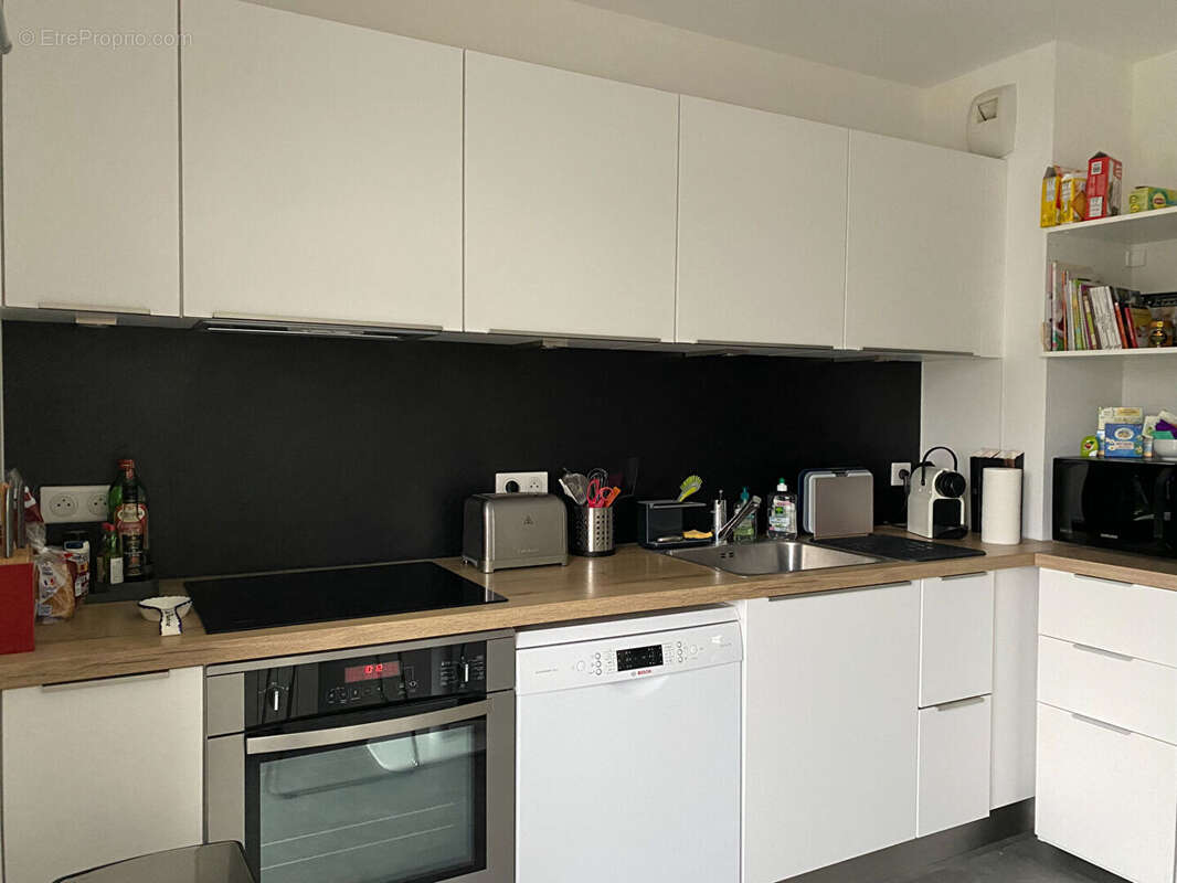 Appartement T4 en duplex de 101.44 m²  (111.65 m² au sol) au dernier étage avec terrasse et garage double. - photo 8