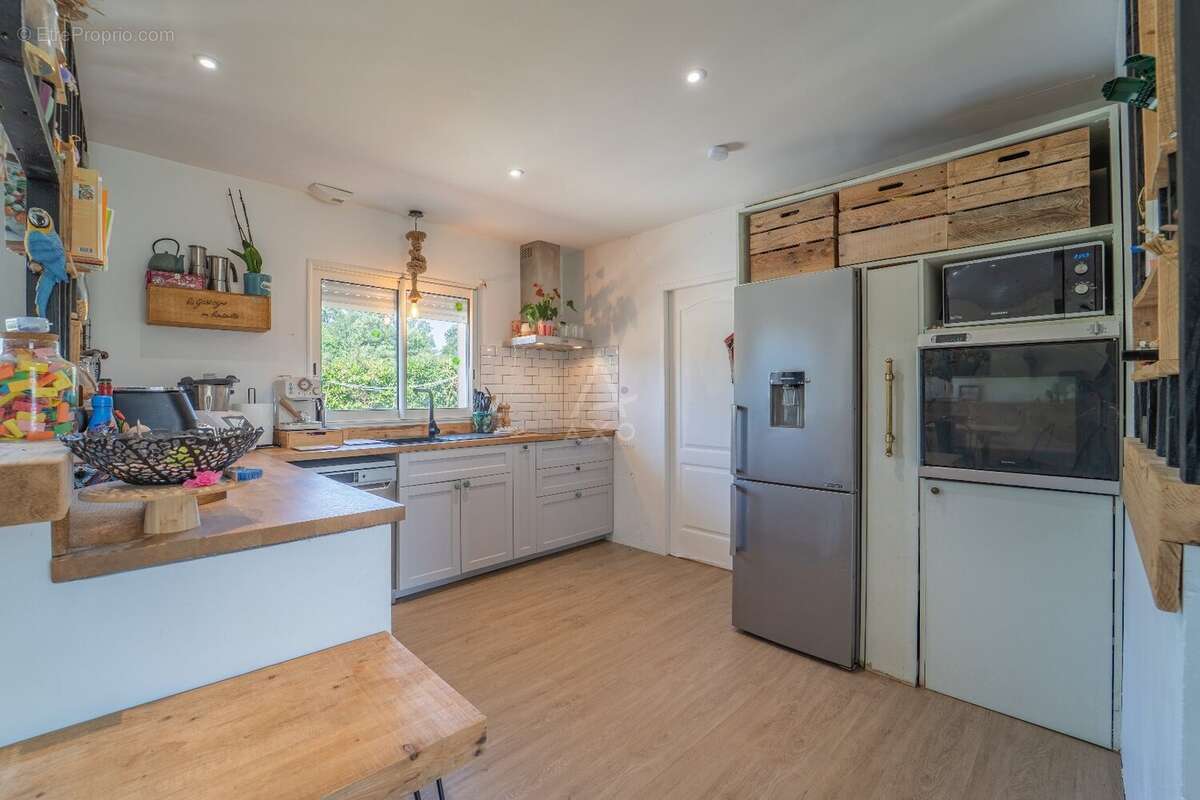 Maison familiale de plain pied de 121 m² - photo 4