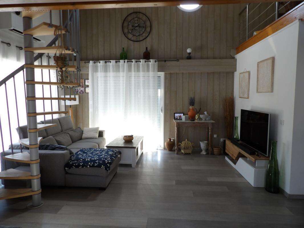 Maison de plain-pied lumineuse avec mezzanine et jardin au c - photo 4