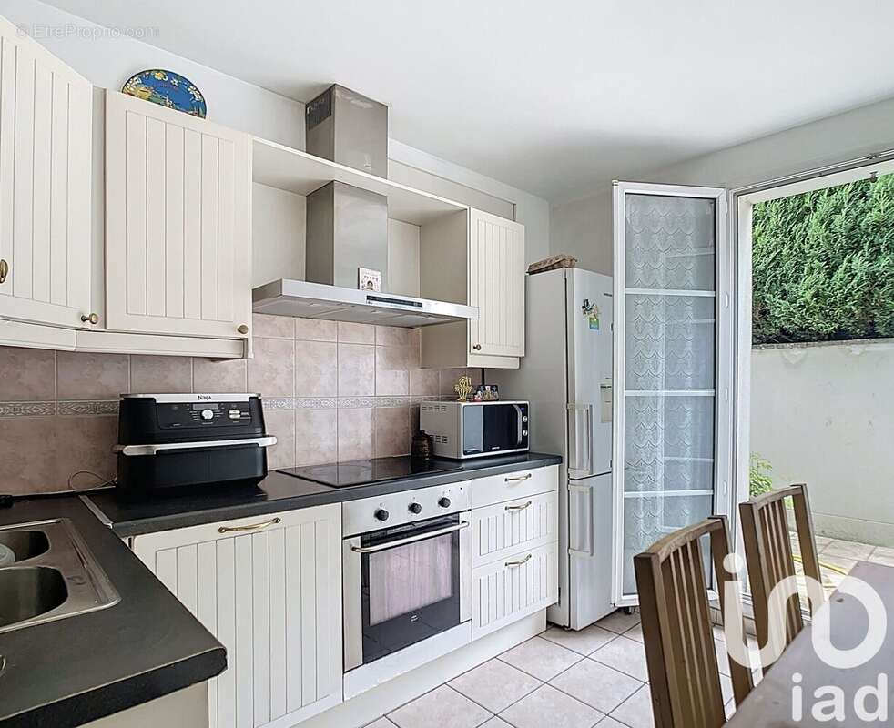 Photo 3 - Maison à LIEUSAINT