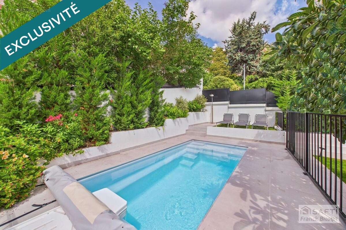 Photo 2 - Maison à COURBEVOIE