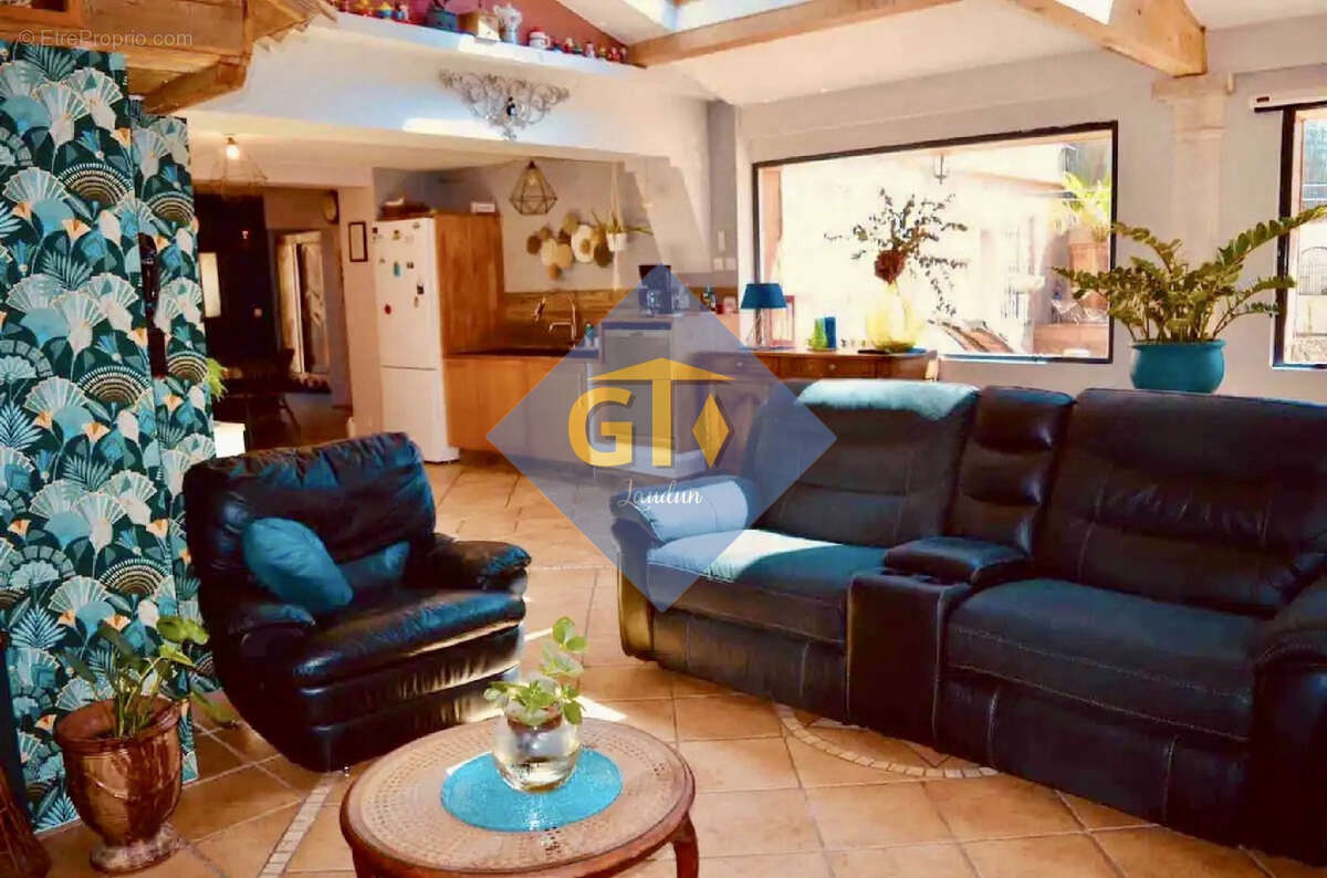 Maison à LAUDUN-L'ARDOISE