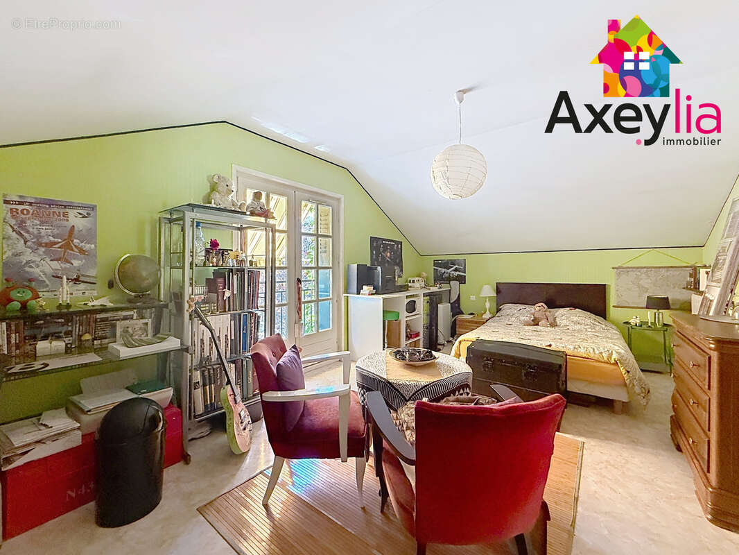 A vendre - riorges - maison avec deux chambres, garage et terrain clos - photo 11