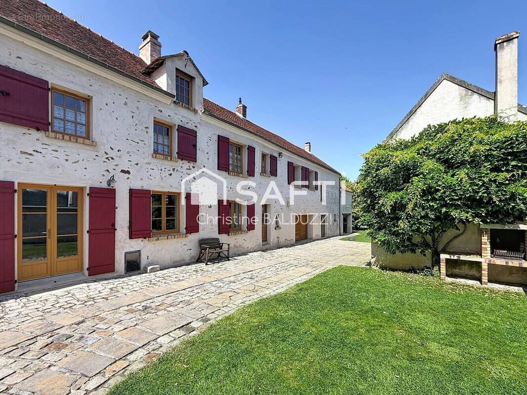 Photo 1 - Maison à MONTREUIL-AUX-LIONS