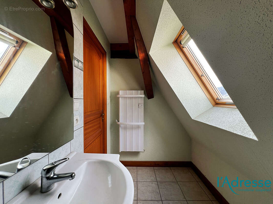 Appartement  en duplex F4 - avec stationnements et jardin - photo 11