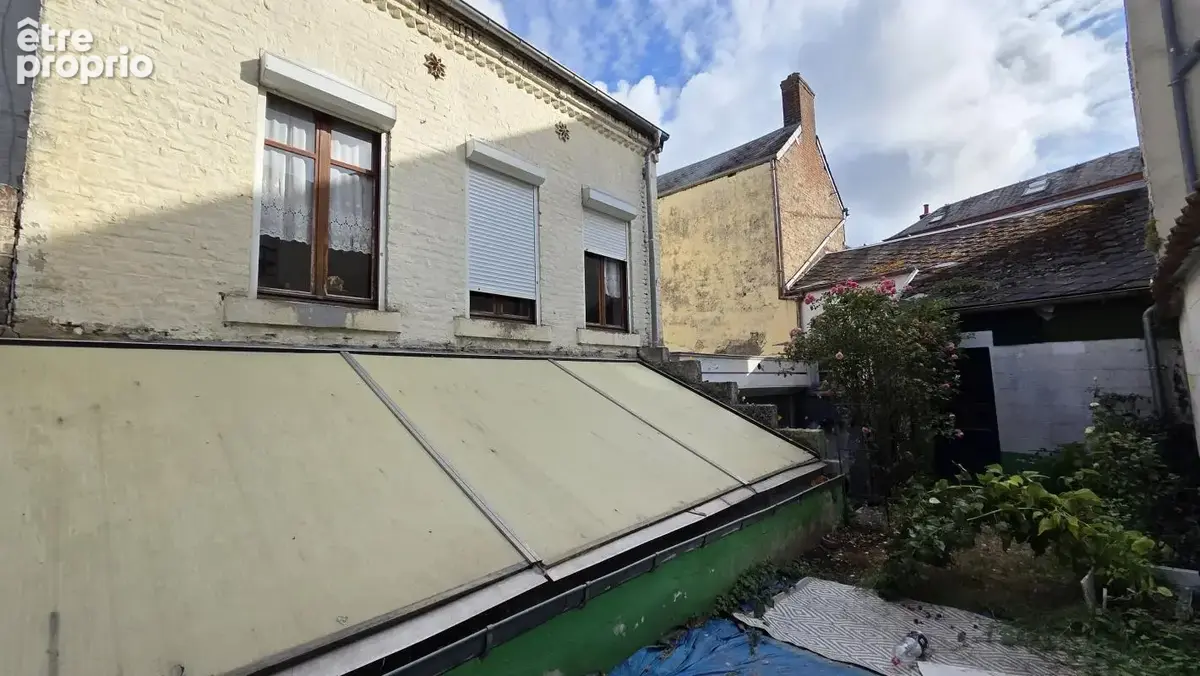 Immeuble comprenant une surface commerciale, une maison et un garage, situé en centre ville de Fourmies - photo 15