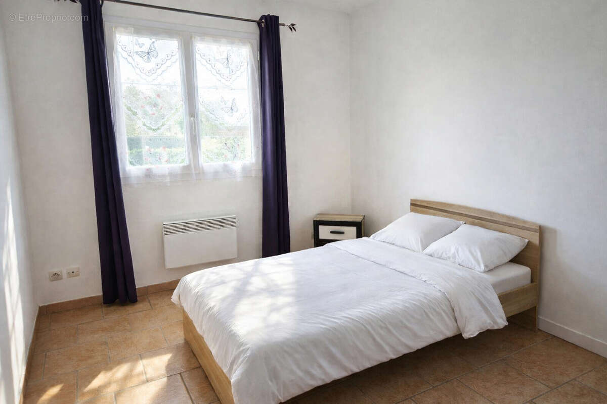 Maison à BUCHY