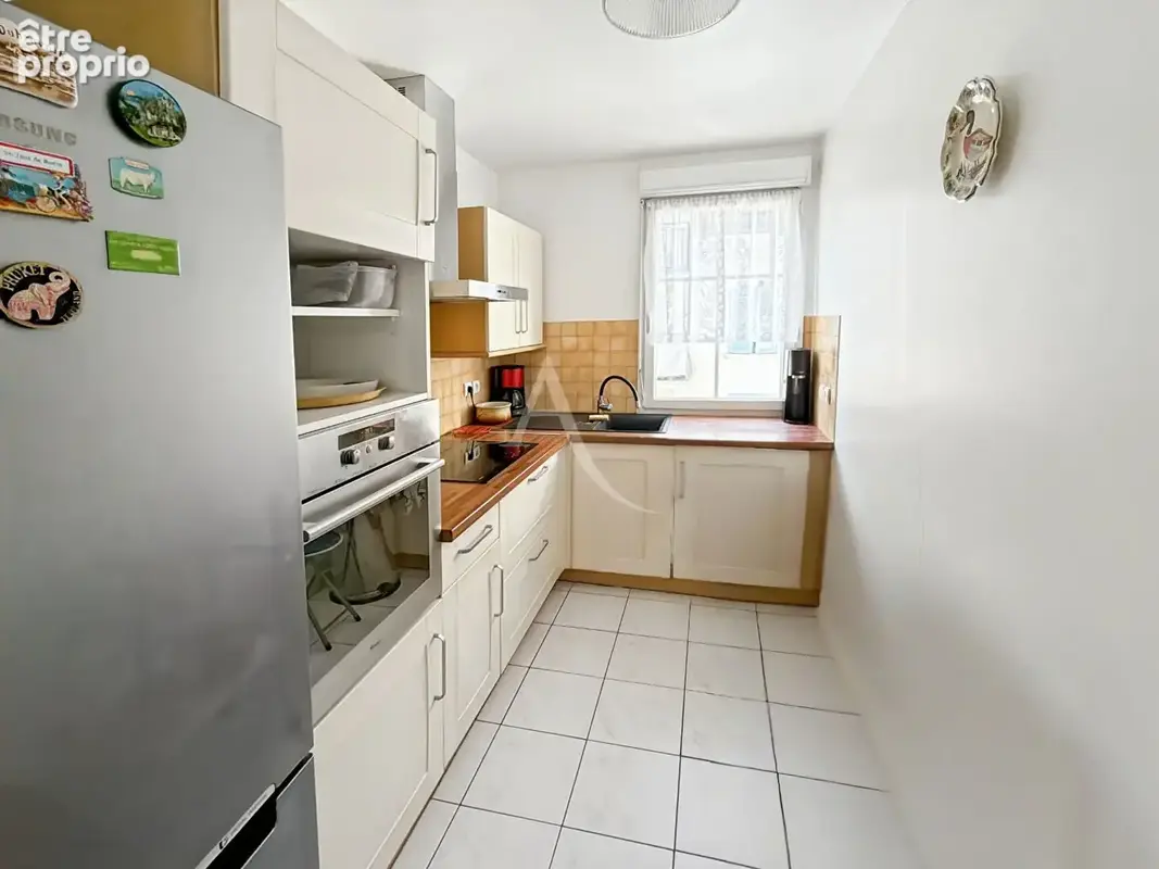 COEUR DE VILLE Appartement F3 de 67 m2 avec terrasse de 9 m2, 1 place de parking en sous-sol sol - photo 6