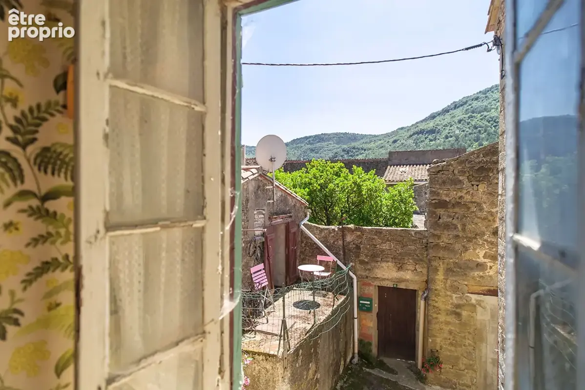 CARCASSONNE - GREFFEIL - Maison de village en pierre  T6 139m² (80m² hab.)  avec remise attenante et vue dégagée - photo 10