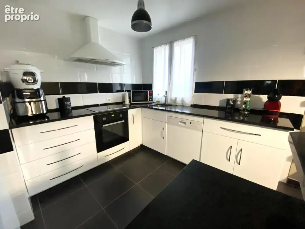 Maison 4 pièces 75 m² à vendre à Amfreville-La-Campagne (27370) - photo 3