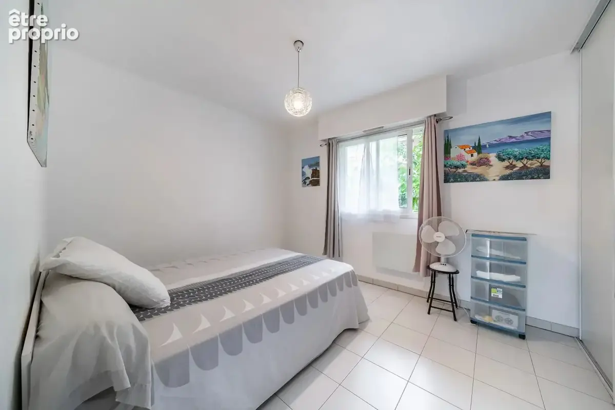 2p traversant 45 m² – double terrasse – parking - photo 4