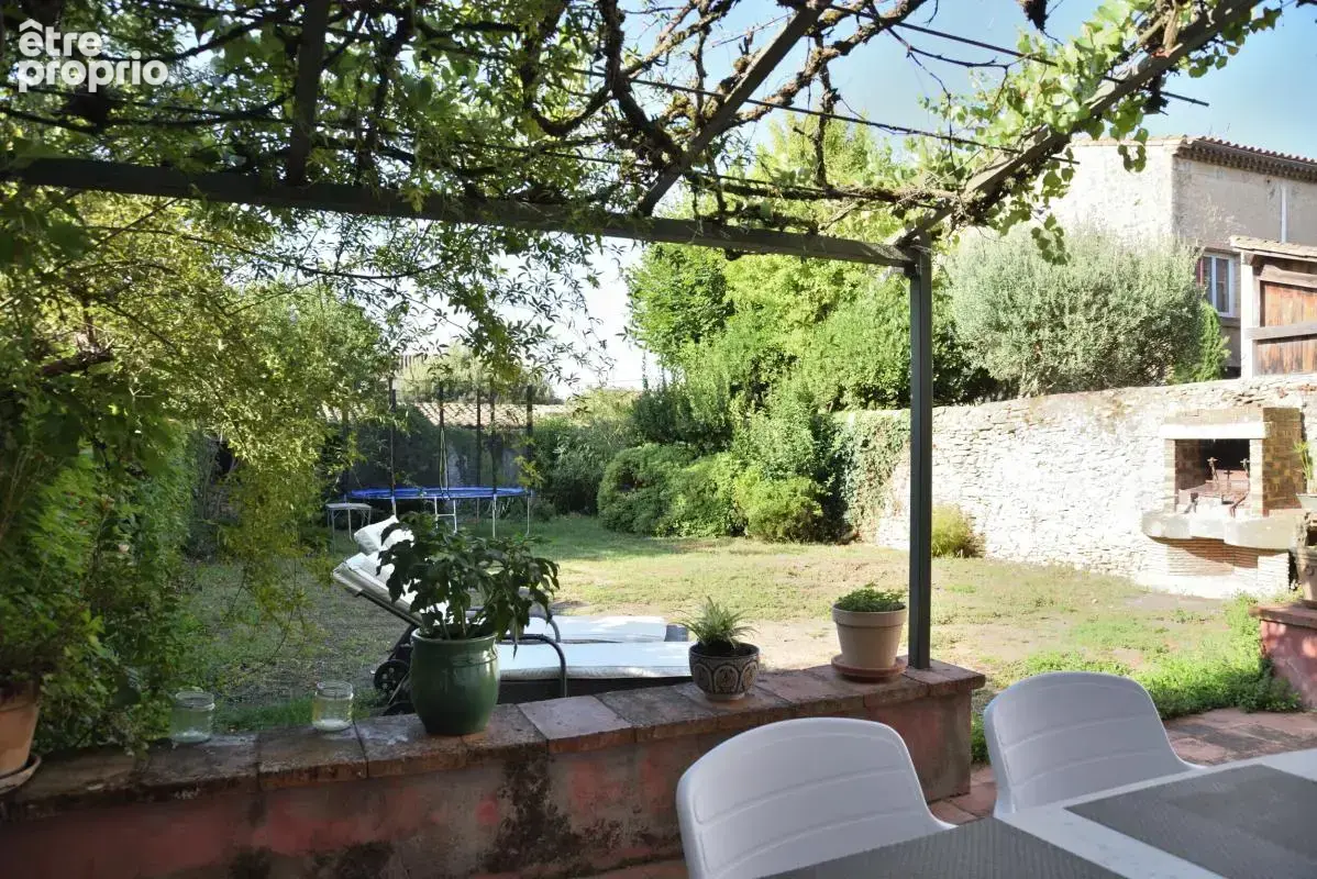 Maison de caractère avec beau jardin arboré avec possibilité local professionnel - photo 22