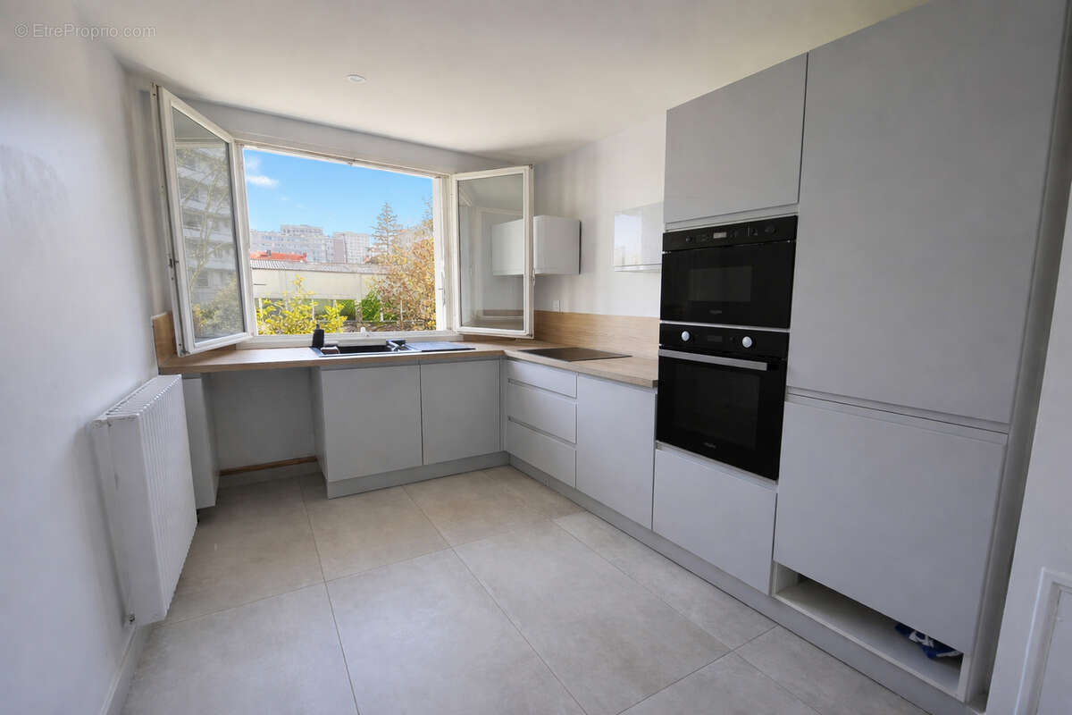 Appartement 3 pièce(s) 74,35 m2 - Villeurbanne Gratte Ciel - photo 6
