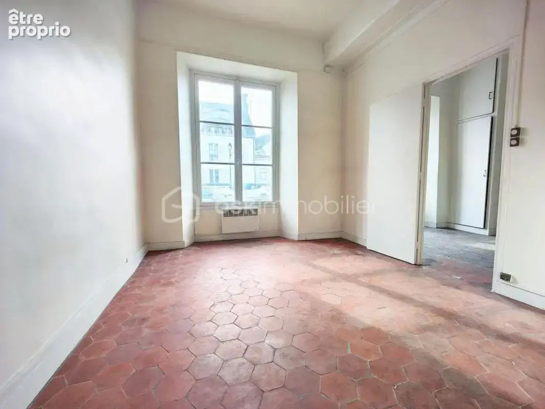 Ensemble immobilier (local commercial + appartement) plein centre ville - photo 5