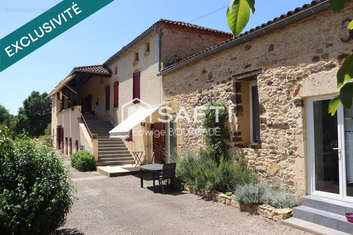 Photo 1 - Maison à PUY-L'EVEQUE