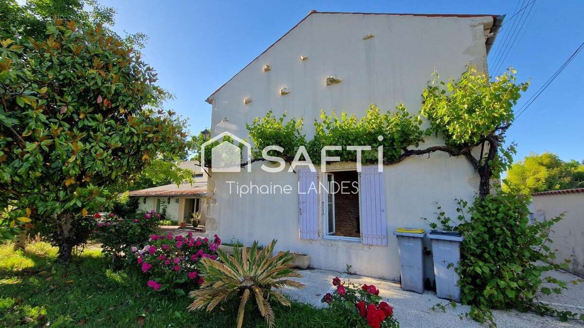 Photo 2 - Maison à AIGREFEUILLE-D'AUNIS
