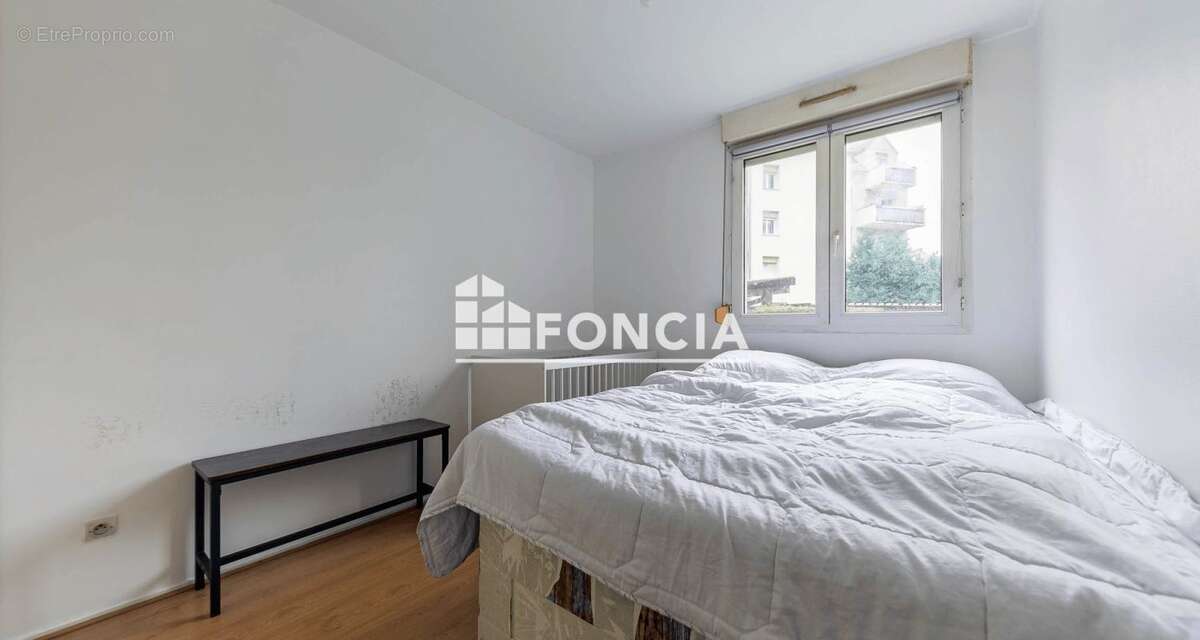 EXCLUSIVITE FONCIA -  Spacieux trois pièces avec balcon et parking intérieur - photo 6