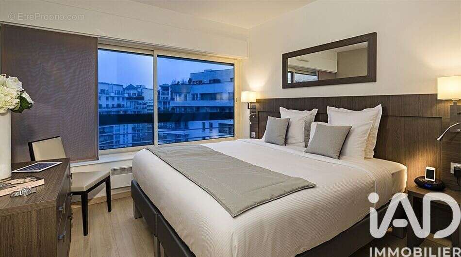 Photo 4 - Appartement à COURBEVOIE