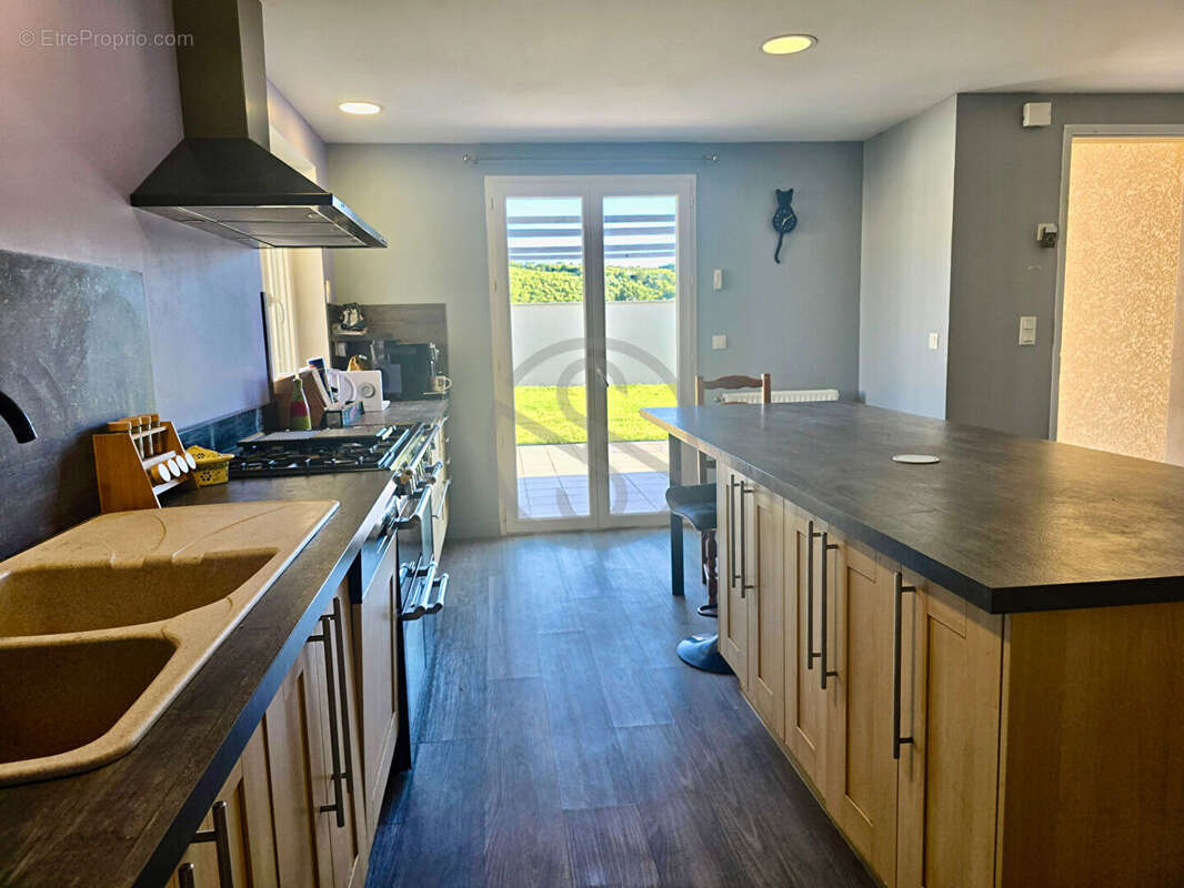 Maison de plain-pied de 126m2 - photo 4