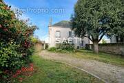 Photo 1 - Maison à LES LANDES-GENUSSON