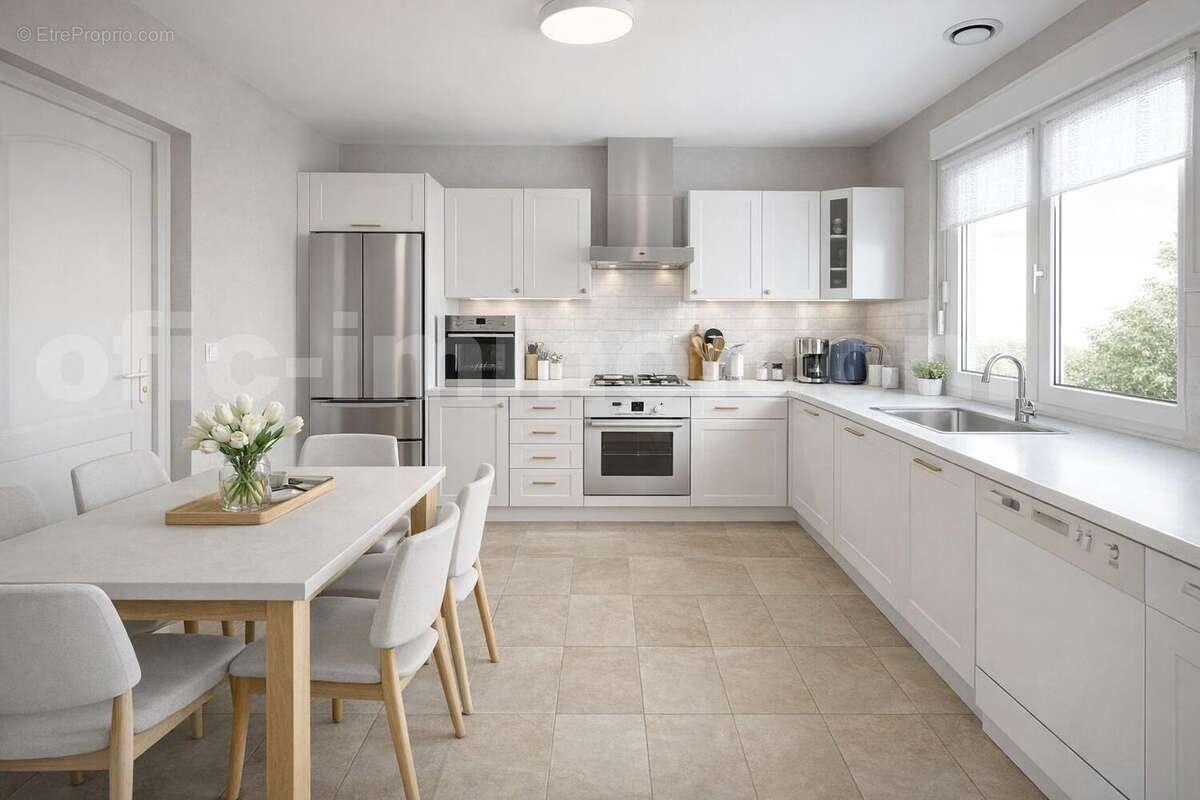 Cuisine lumineuse et moderne avec table à manger - Maison à SARZEAU