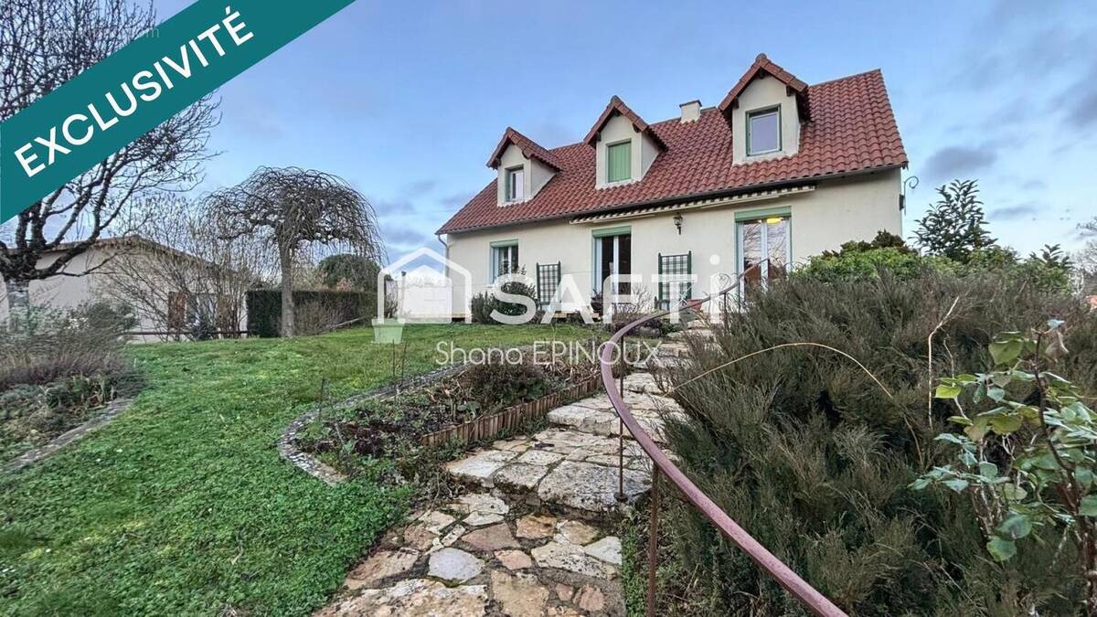 Photo 1 - Maison à FONTAINE-LE-COMTE