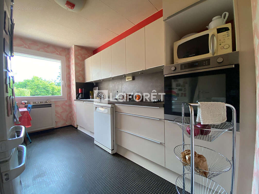 Appartement 2 chambres avec balcon, cave et parking sous-sol  ROUEN Descroizilles - photo 5