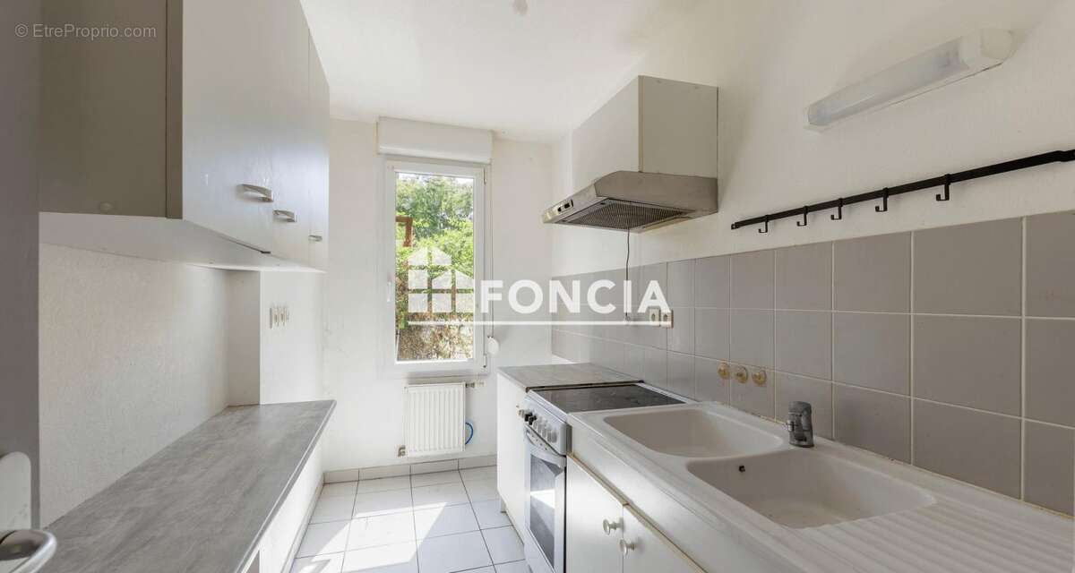 Appartement 2 pièces avec balcon et parking sécurisé à Pfastatt - Idéal investissement ou premier achat - photo 2