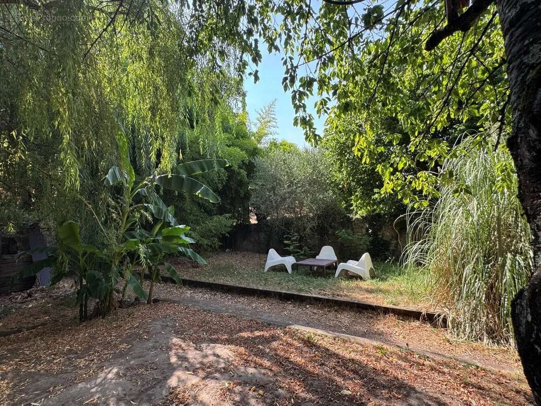 Maison centre ville avec jardin - photo 2