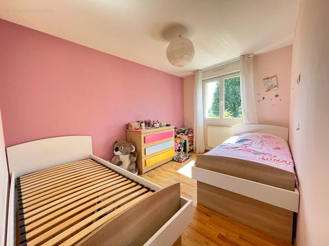 Maison familiale avec jardin dans un secteur recherché d'Irigny-le-Haut - photo 12