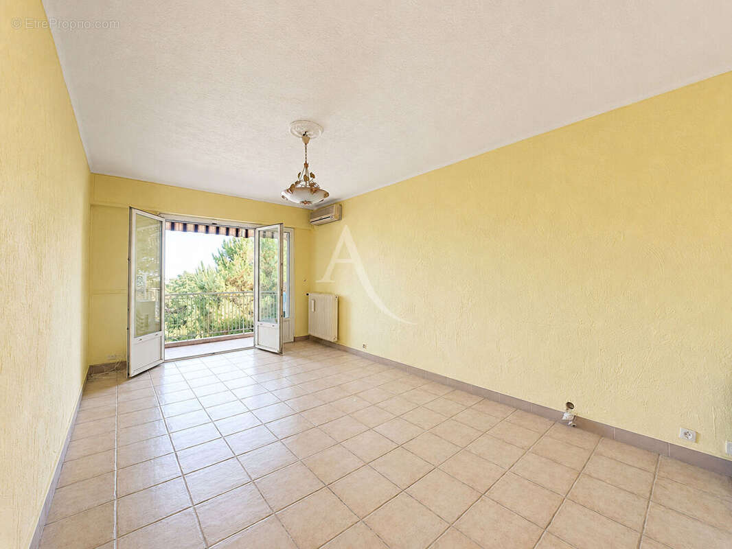 Appartement 3 pièces - traversant - garage - cave - photo 2