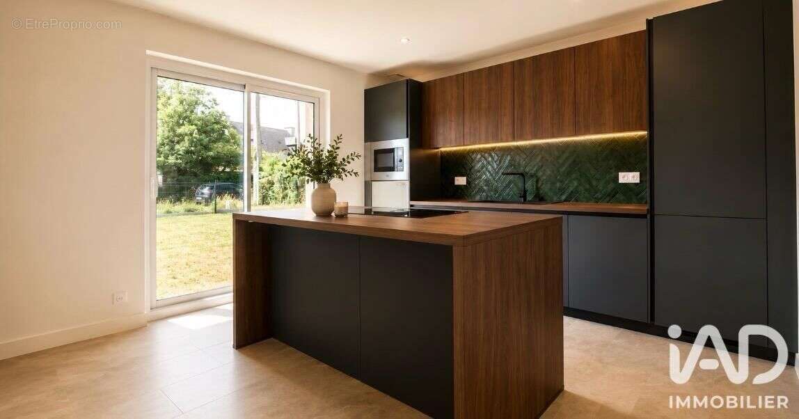 Maison 145 m² à Saint-Carne  - photo 2
