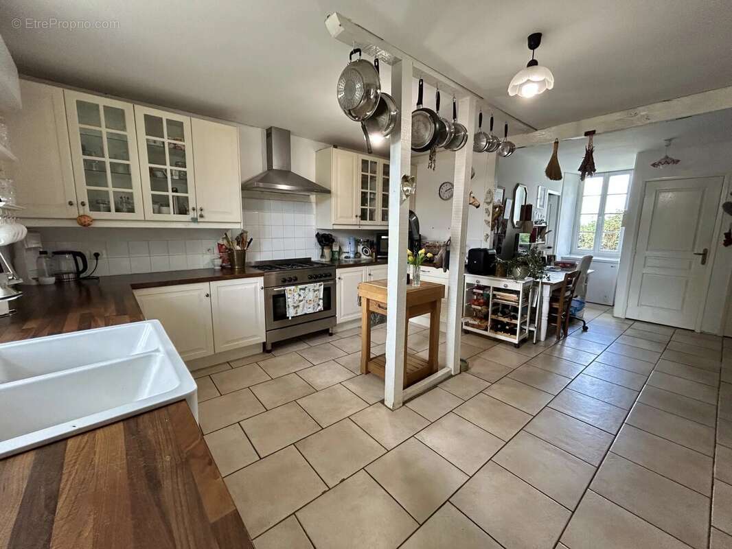 Ferme de caractère avec 4 à 5 chambres, 1,5 hectares de terrain et possibilité de gîte - photo 5