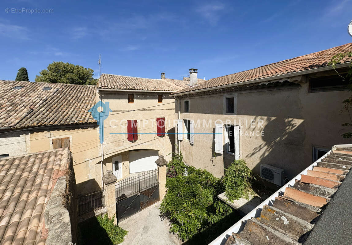 Maison à LAUDUN-L'ARDOISE