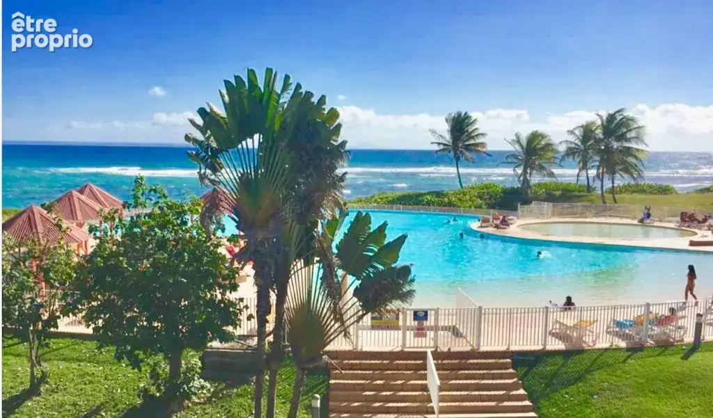 Anse des rochers : 1/4 villa t2 rdc de 35,37 m2 meuble citerne acces plage et piscine - photo 12