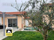 Maison à SAINT-GENIS-LES-OLLIERES