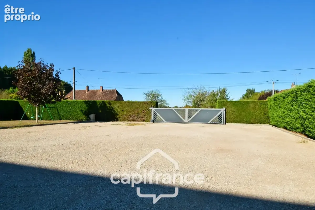Maison de plain-pied 3 chambres, garage et terrain au calme proche LOUHANS (71) - photo 10