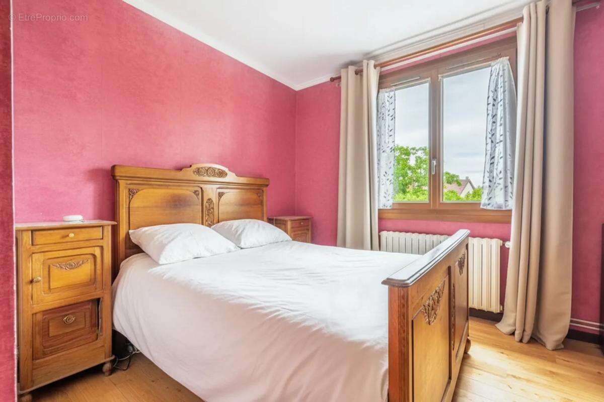 Maison de 5 pièces de 80 m² à Sainte-Geneviève-des-Bois - photo 6