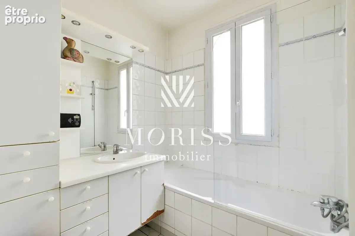 Appartement 5 piéces rue duhesme 75018 paris - photo 11