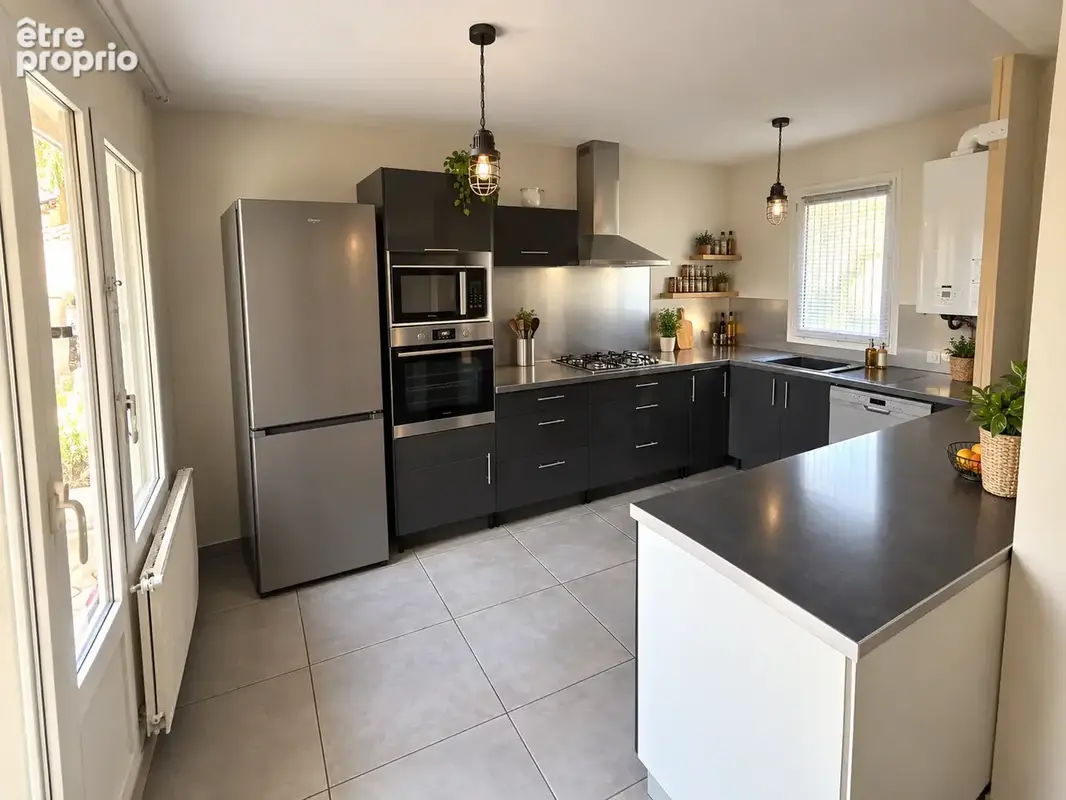 Maison de 95 m2 avec jardin et garage - photo 3