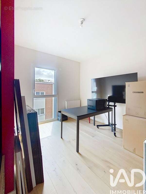 Photo 5 - Appartement à VOISINS-LE-BRETONNEUX