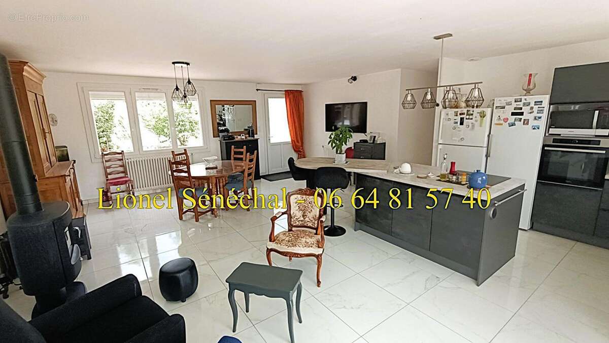 Maison entièrement de plain - pied rénovée, lumineuse et peu énergivore de 5 pièces de 90 m2 habitables - photo 2