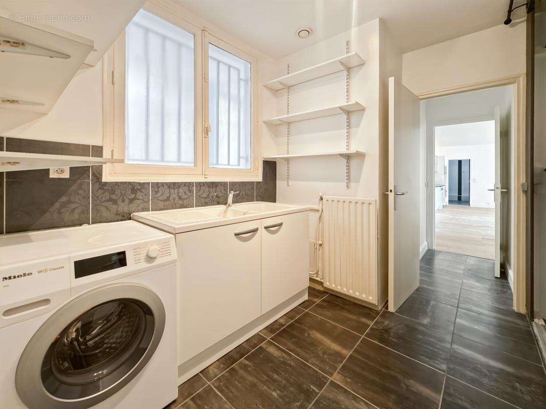 Appartement 106 m² à Paris-9e  - photo 10