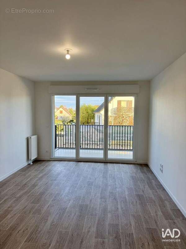 Photo 2 - Appartement à CORMELLES-LE-ROYAL