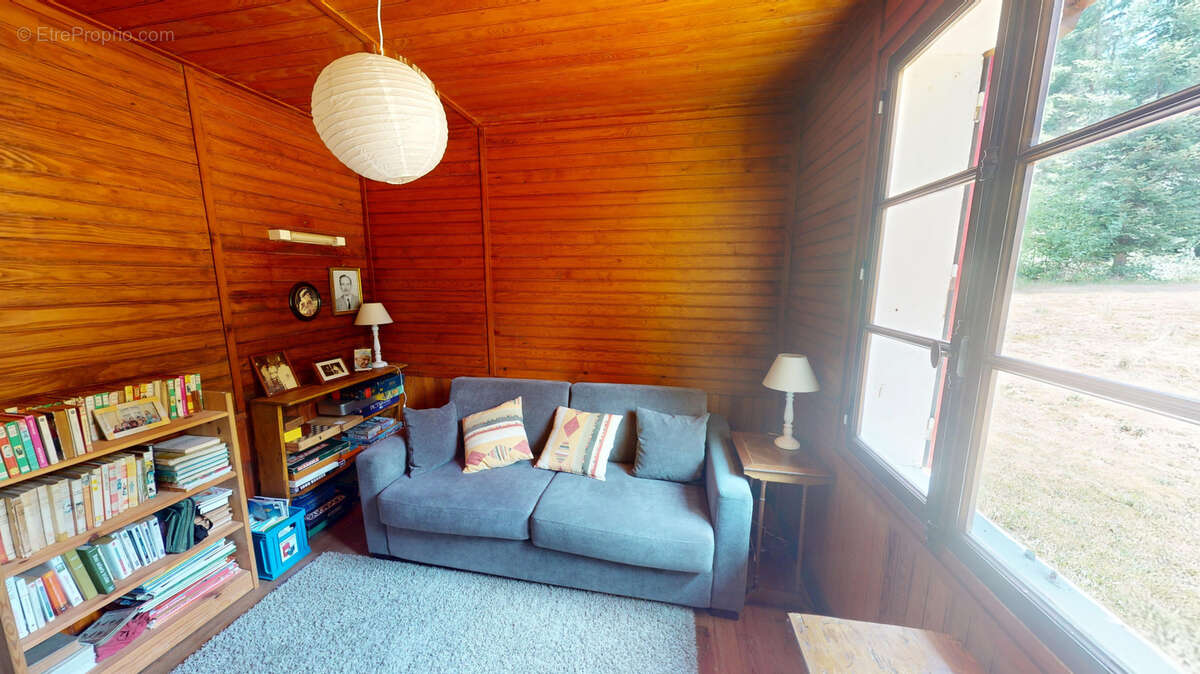 Chalet en bois sur sous sol et terrain attenant boisé - photo 9
